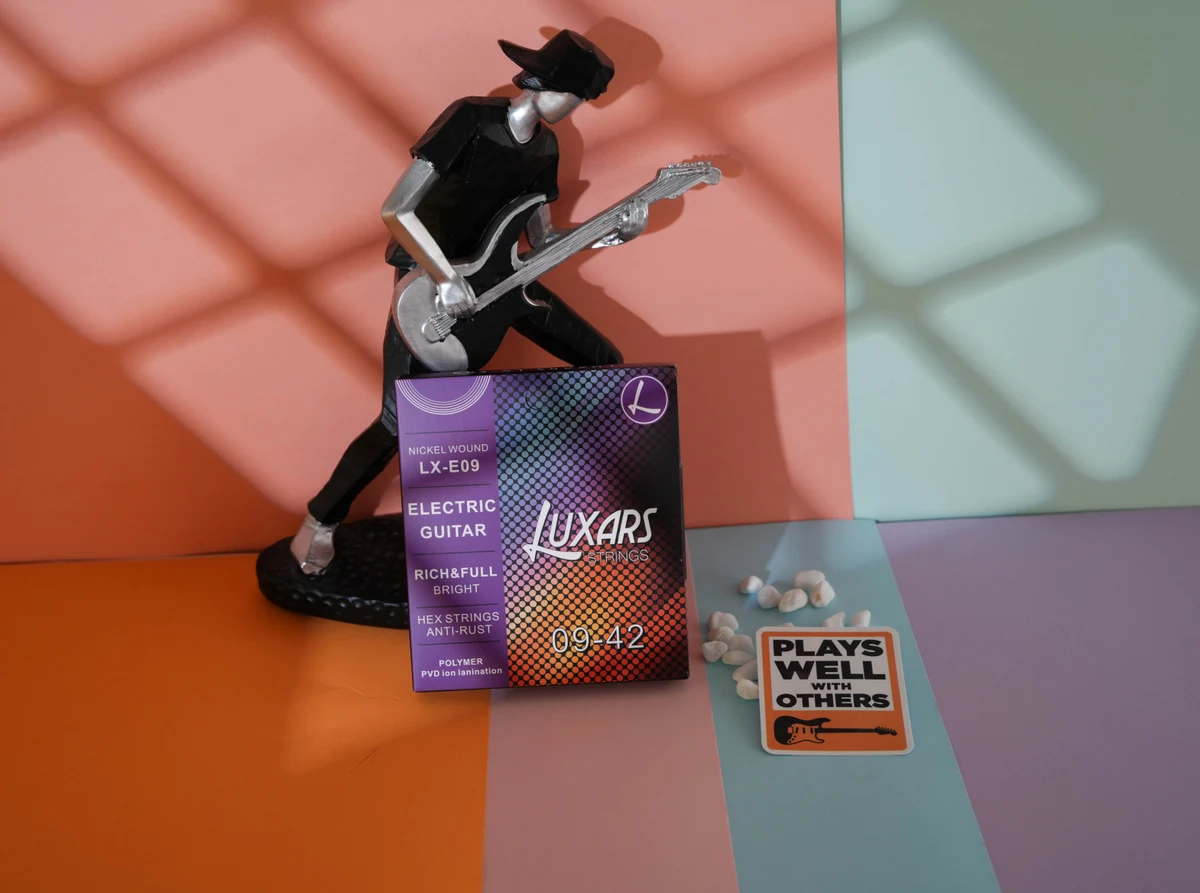 LUXARS LX-E09, embalagem de cordas de guitarra elétrica, vista frontal de um pacote
