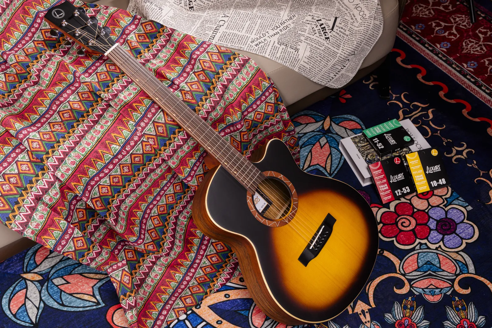 Luxars acoustic guitar and guitar-string packages for product record review